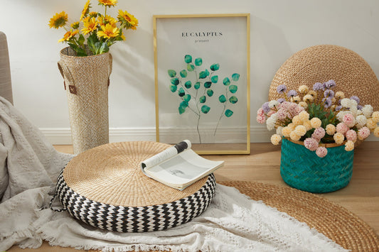 Straw round floor cushion with black and white edge