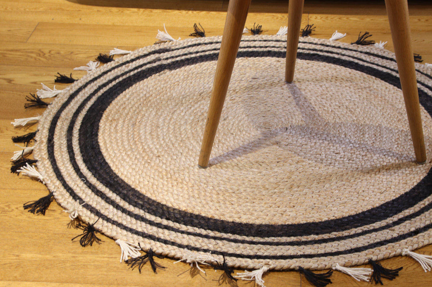 CUSTOM round brown and black woven jute rug with tassels