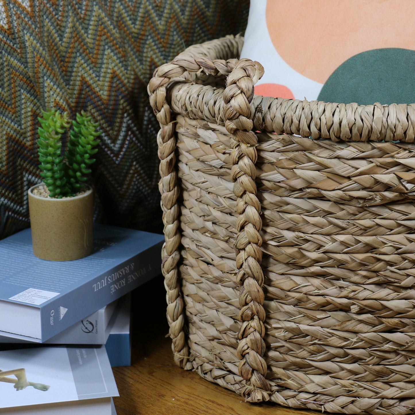 Large round straw baskets with two strong handles