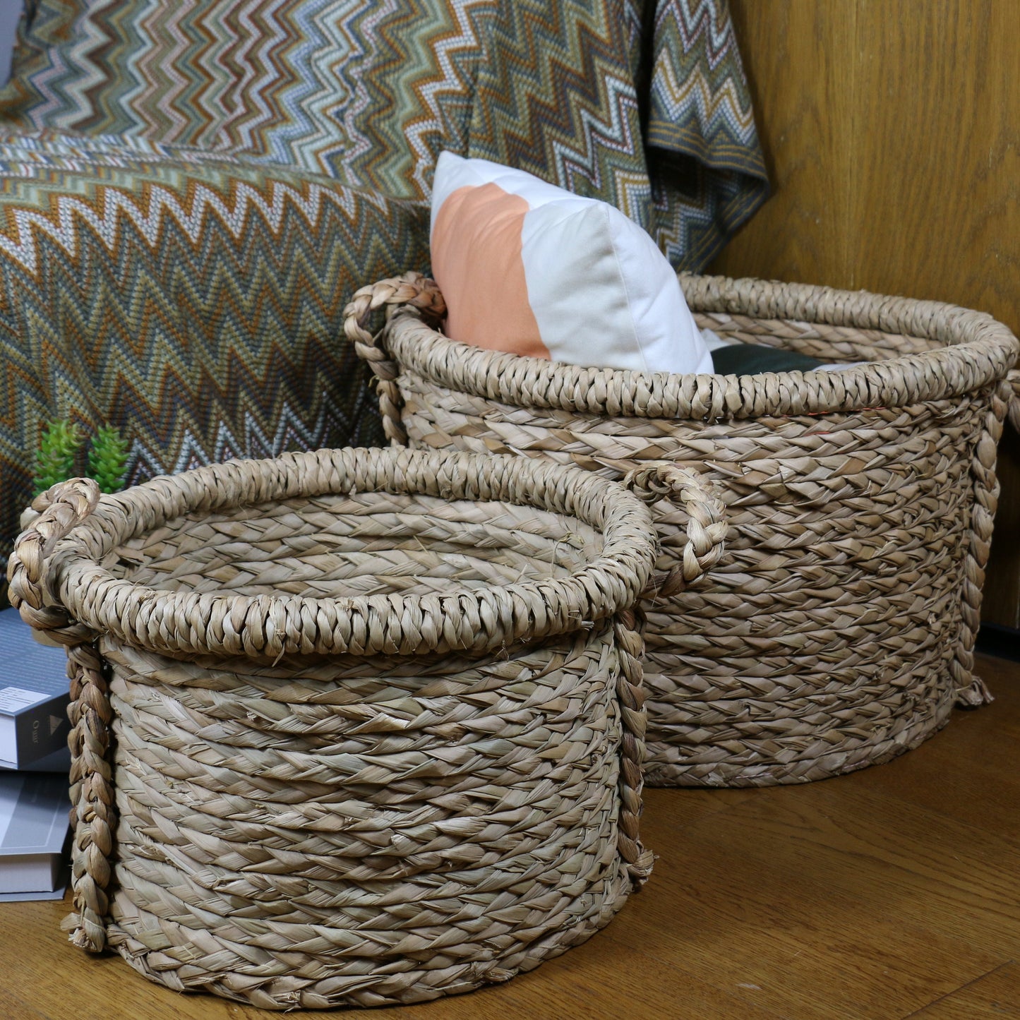 Large round straw baskets with two strong handles