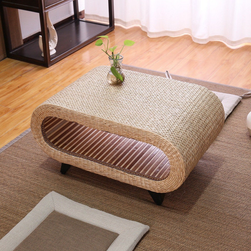 Beige coffee table with small legs