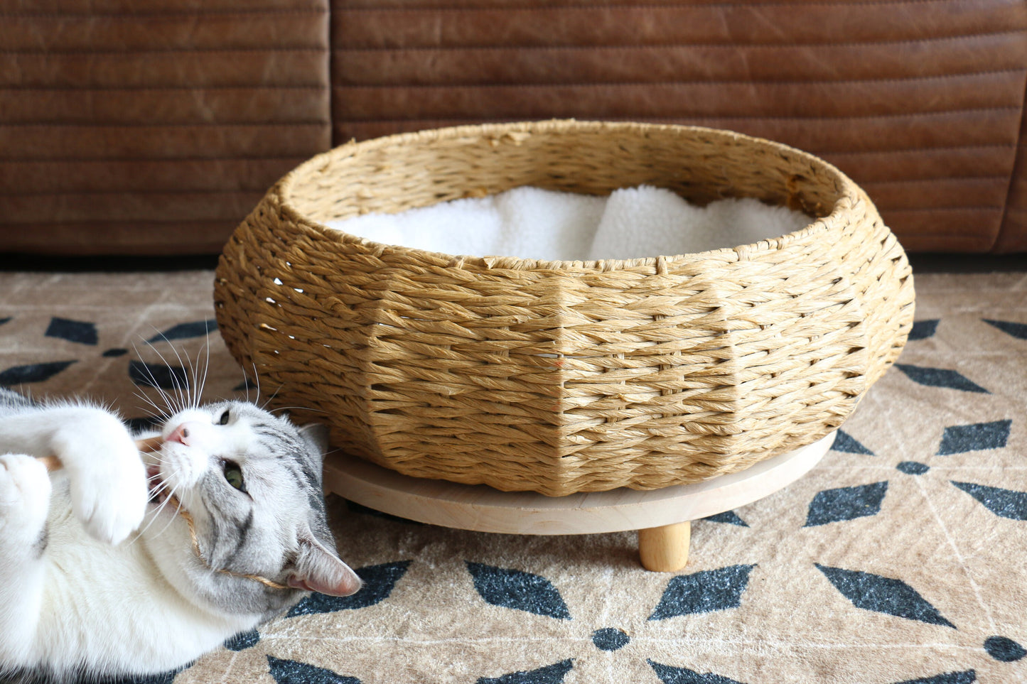 Rustic round cat bed with wood base