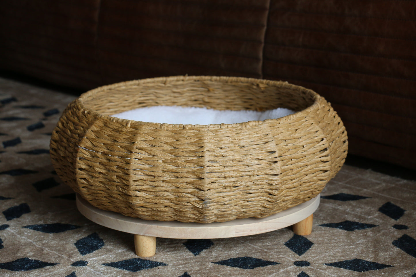 Rustic round cat bed with wood base