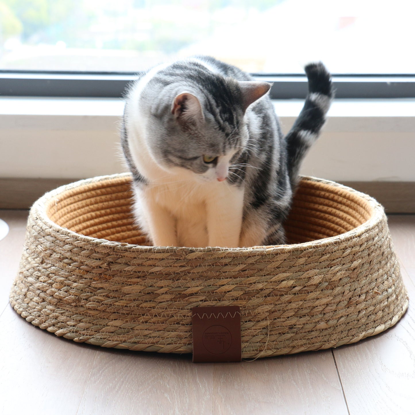 Rustic round straw and cotton rope cat bed